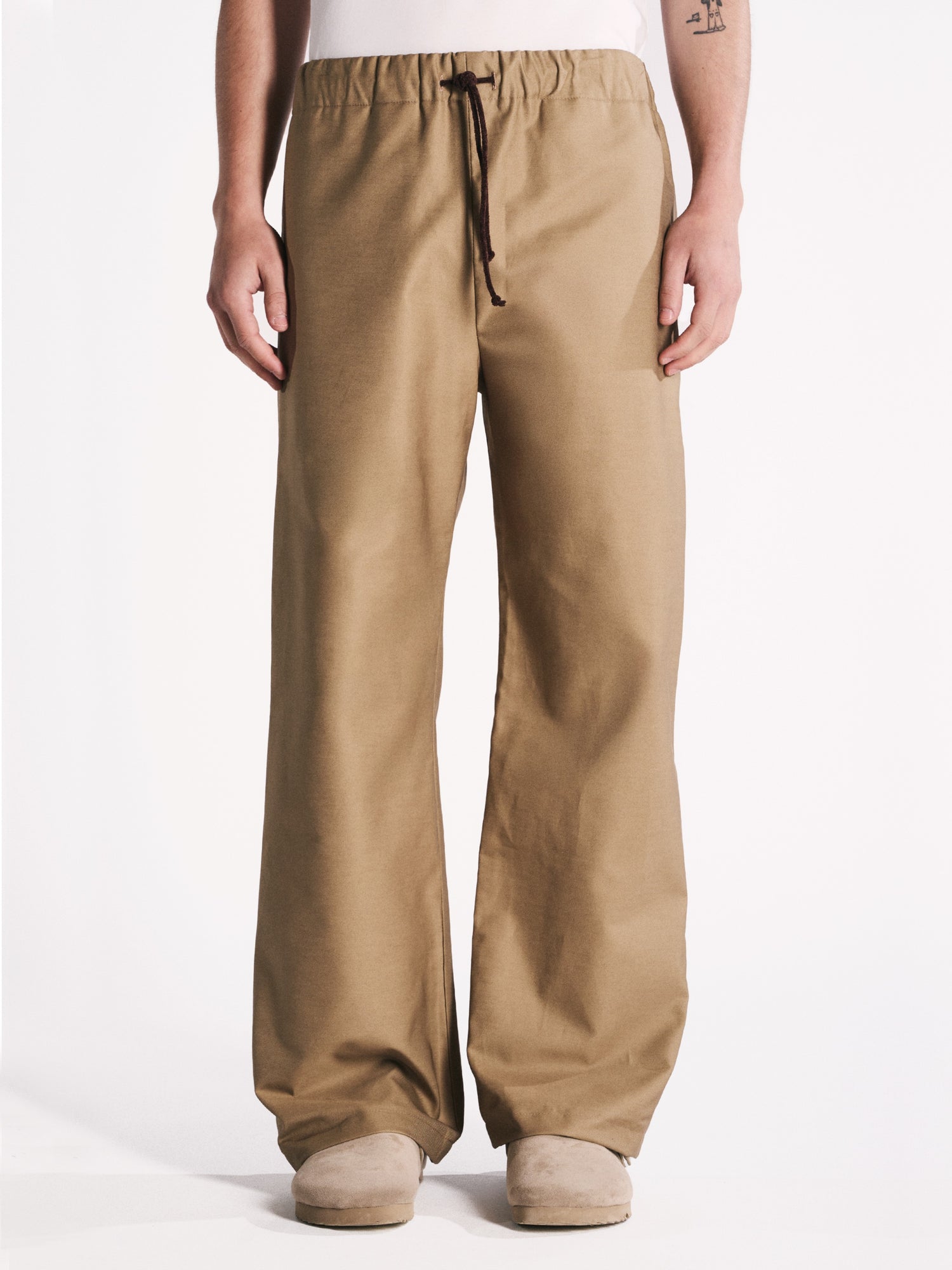 EARTH-TONED WATERPROOF TROUSERS