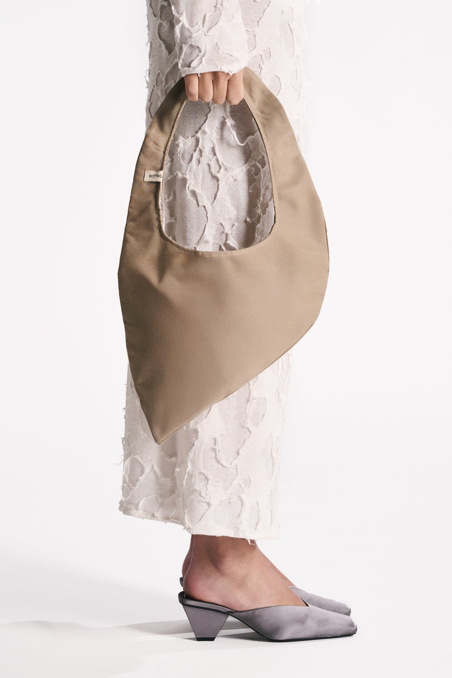 EARTH-TONED WATERPROOF WING BAG