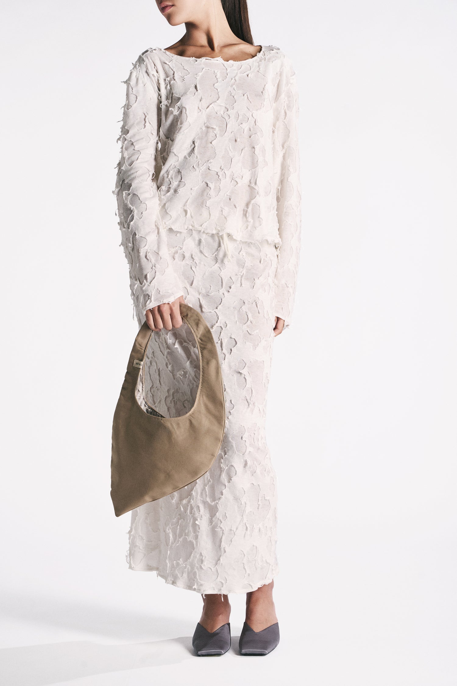 EARTH-TONED WATERPROOF WING BAG