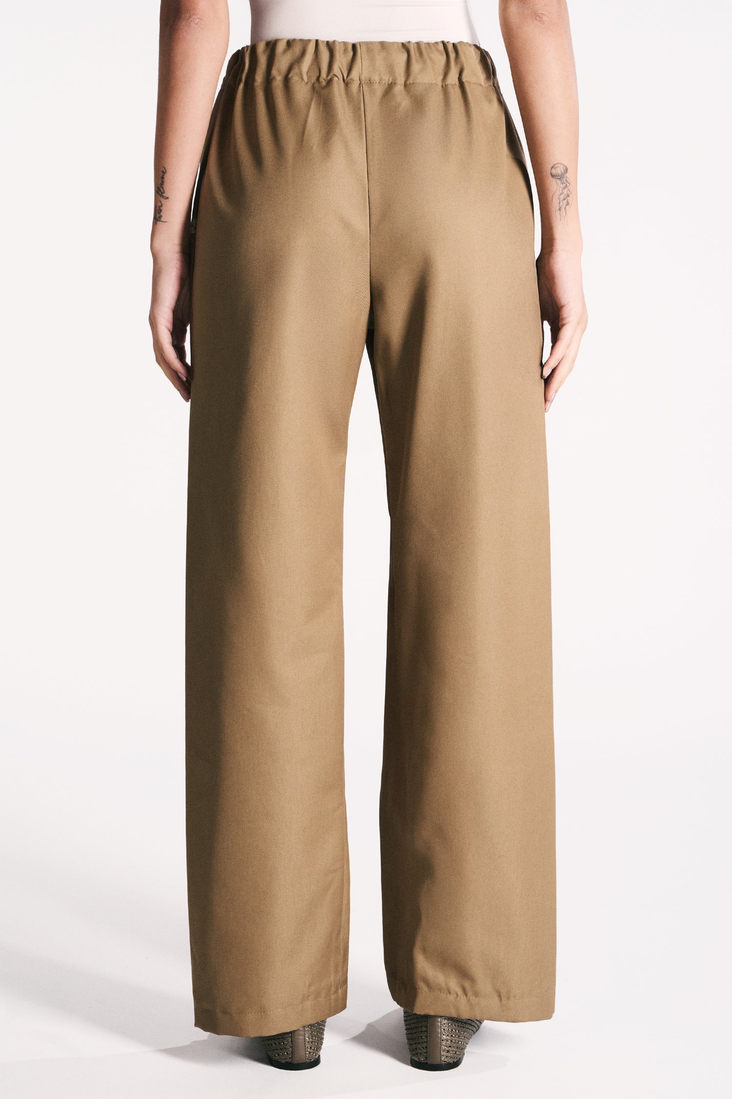 EARTH-TONED WATERPROOF TROUSERS