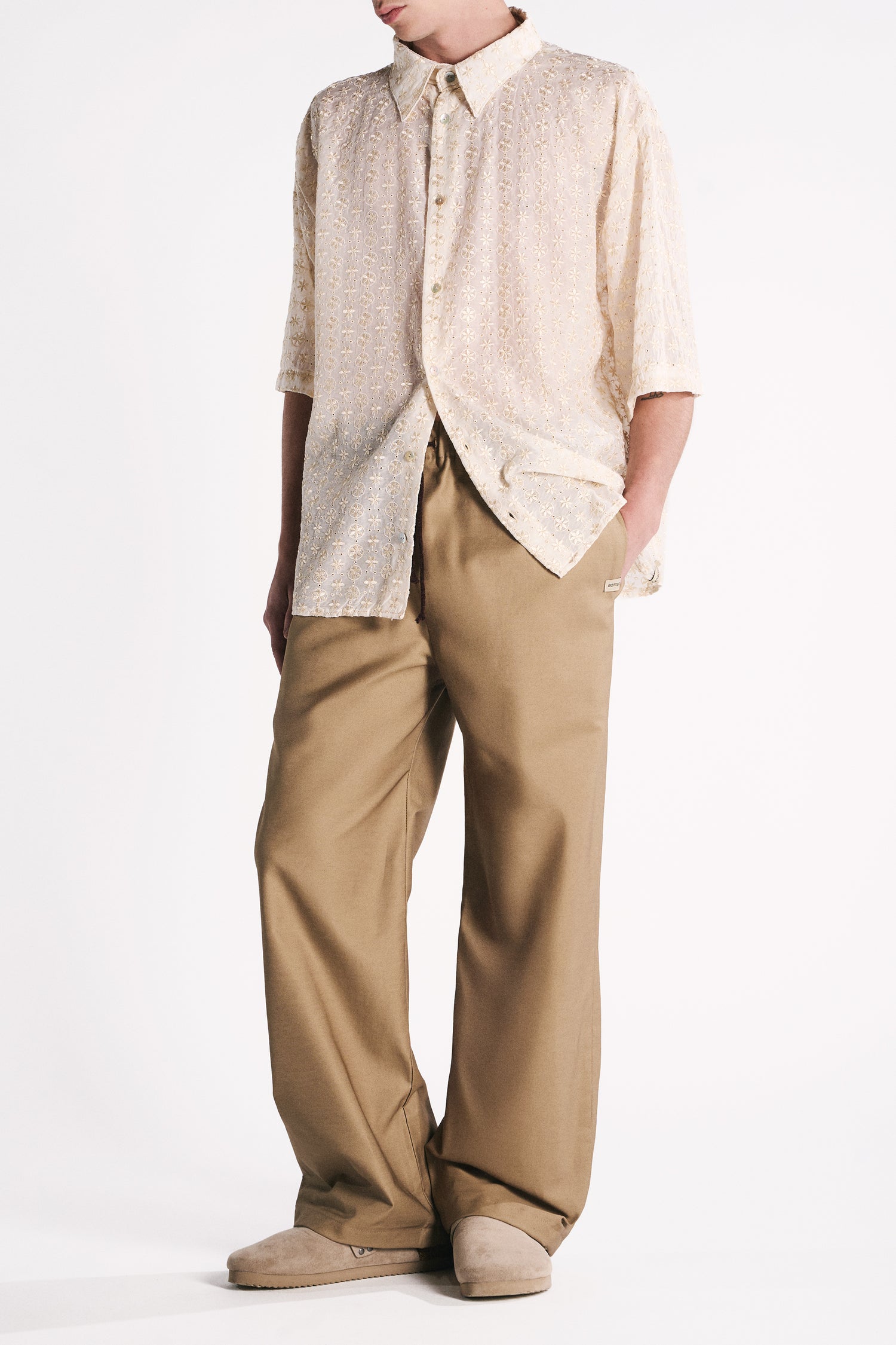EARTH-TONED WATERPROOF TROUSERS