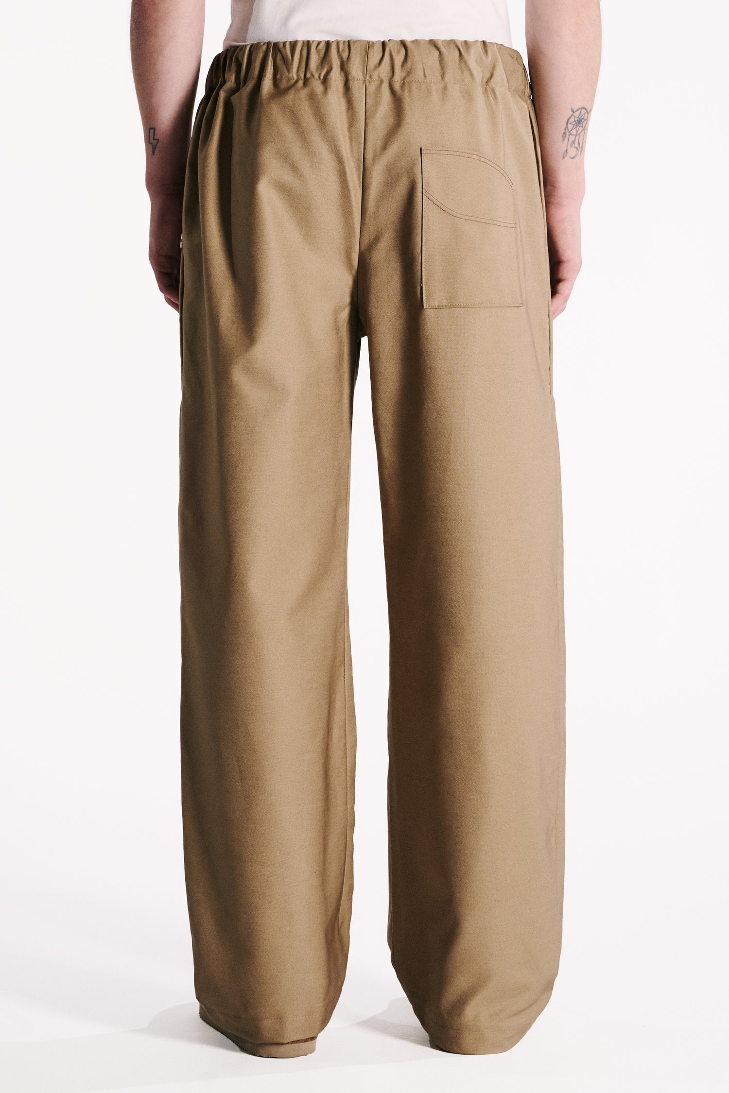 EARTH-TONED WATERPROOF TROUSERS