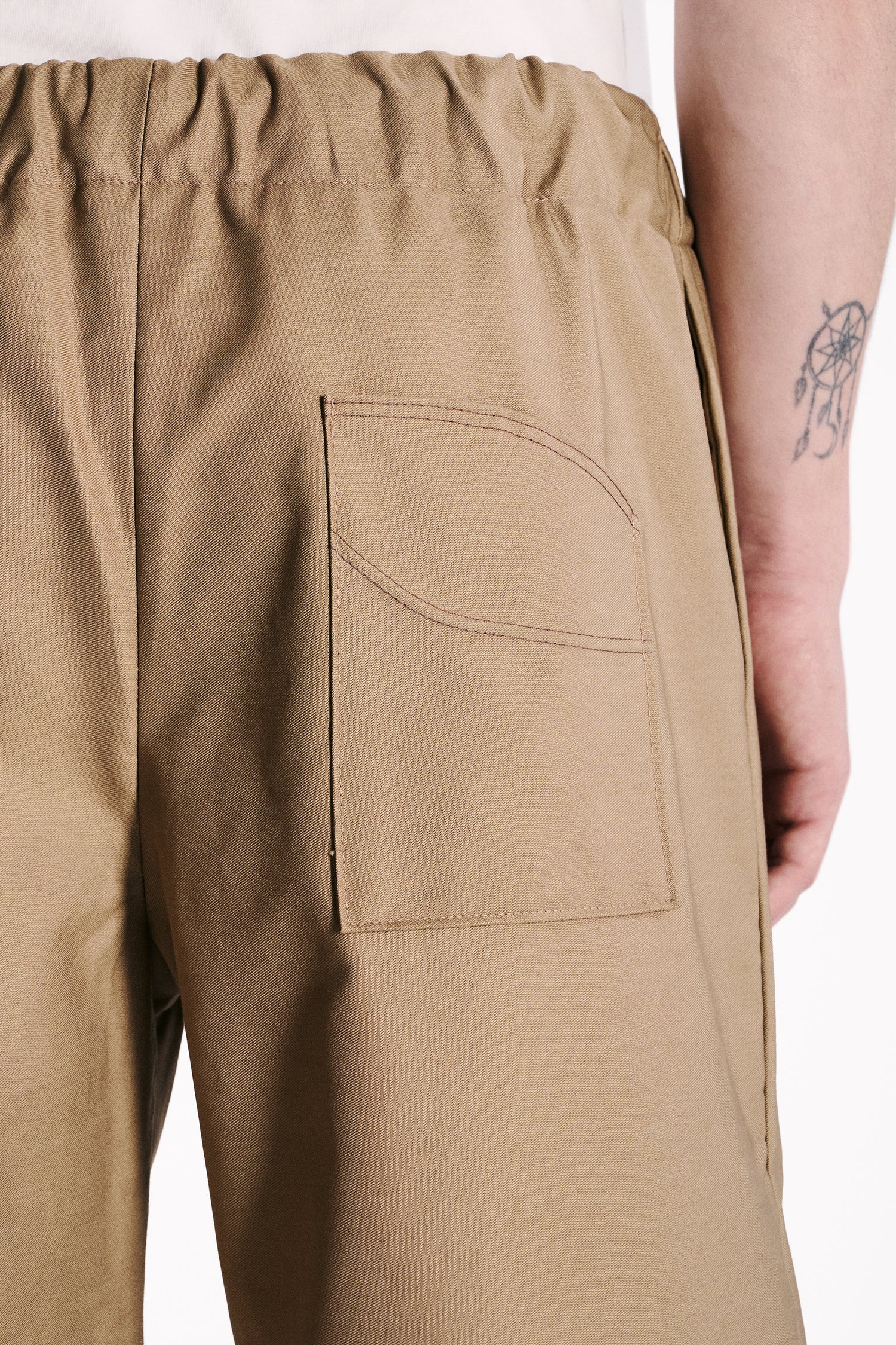 EARTH-TONED WATERPROOF TROUSERS