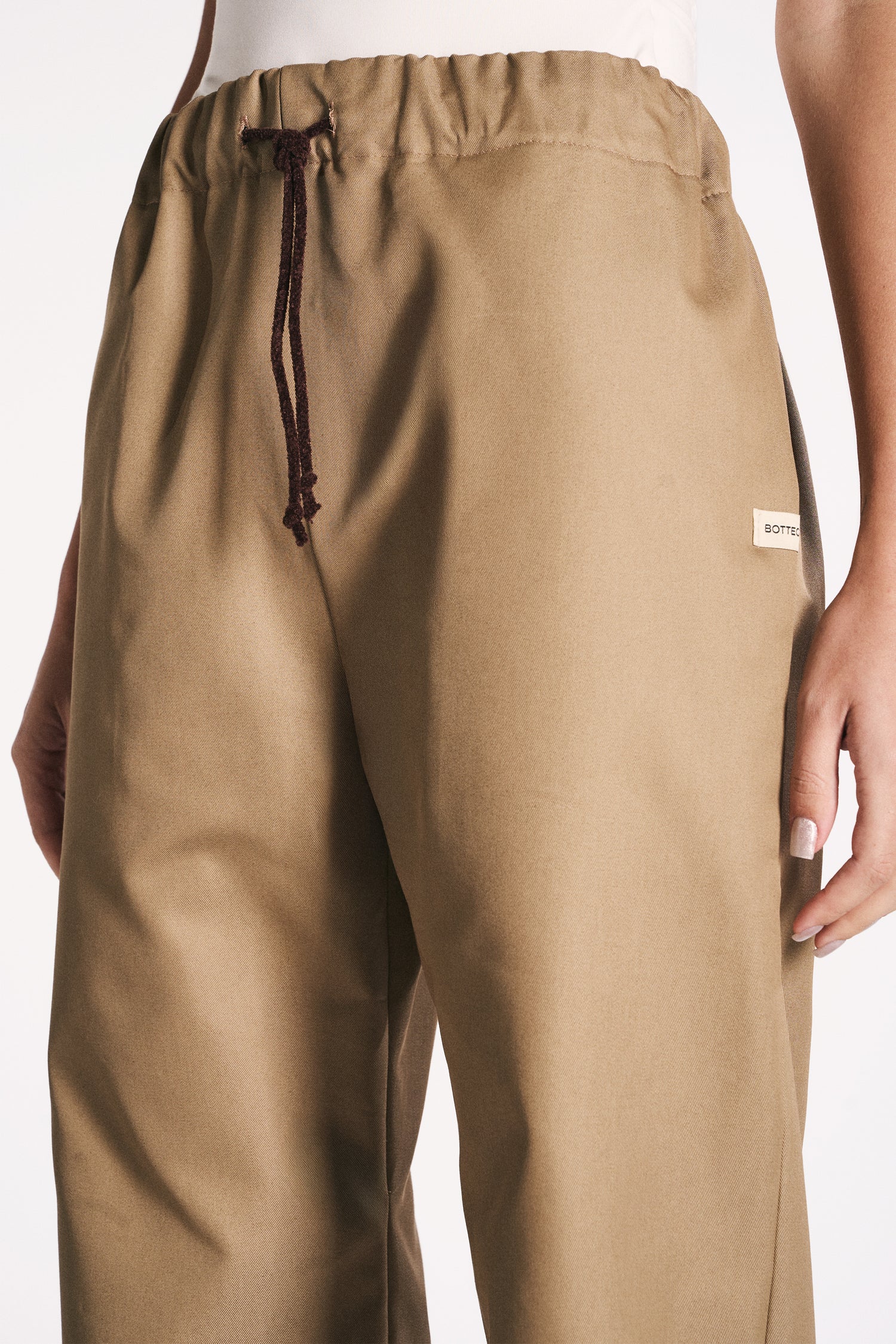 EARTH-TONED WATERPROOF TROUSERS