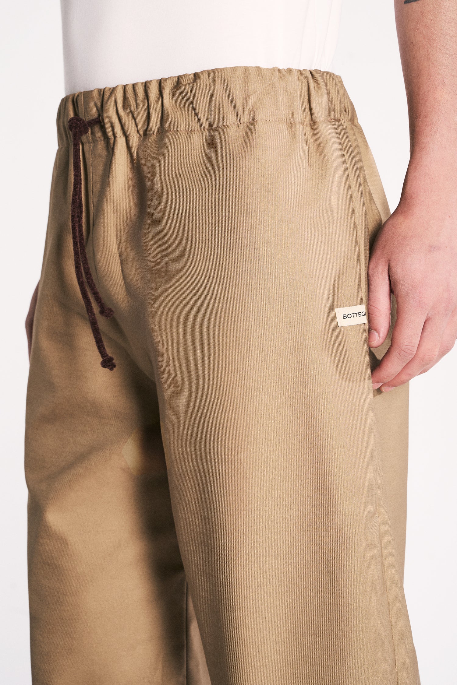 EARTH-TONED WATERPROOF TROUSERS